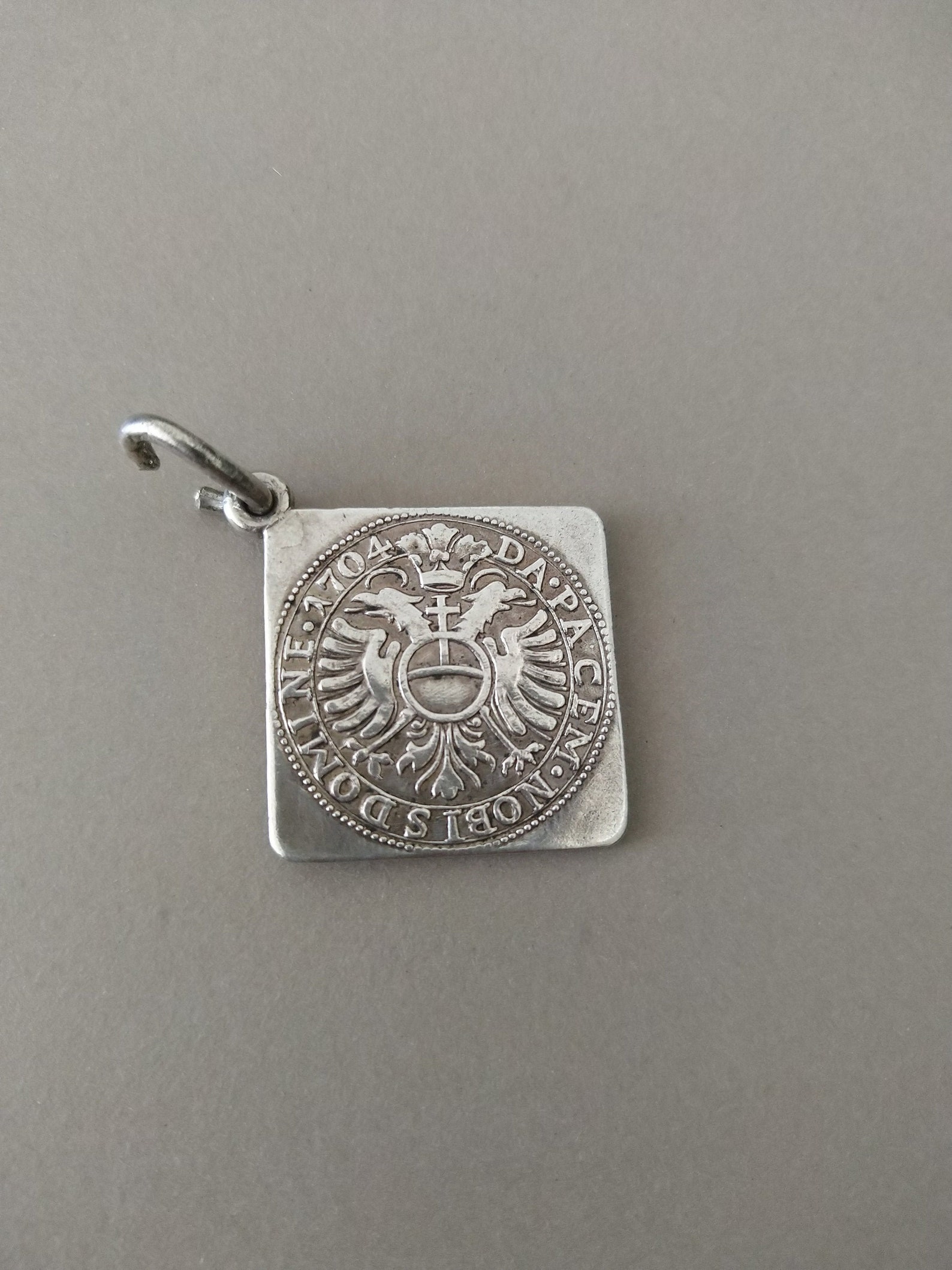 Antique Re-Strike of a 1704 German Thaler Solid Silver Fob Charm Pendant; c. 1900 Re-Strike of Antique German Coin Fob or Pendant