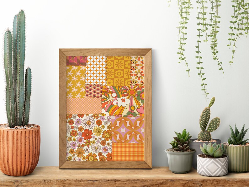 May include: A framed print with a patchwork design featuring various retro patterns in shades of orange, yellow, pink, and green. The patterns include flowers, geometric shapes, and abstract designs.