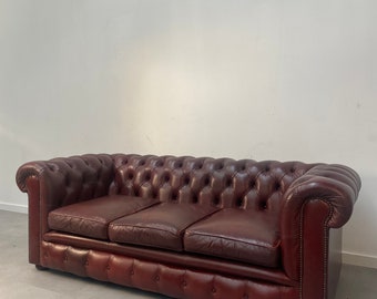 Chesterfield trois places en cuir bordeaux