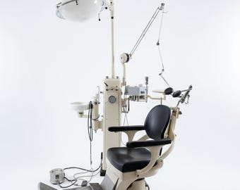 Sillón dental antiguo de los años 30 de EMDA con juego completo de instrumental.
