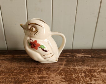 Lovely Small Porcelain Bird Pitcher with gold accents and flower Handpainted Details.