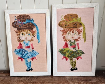 Pair of Framed Needlepoints- Girls in Dress, Hat and Bow