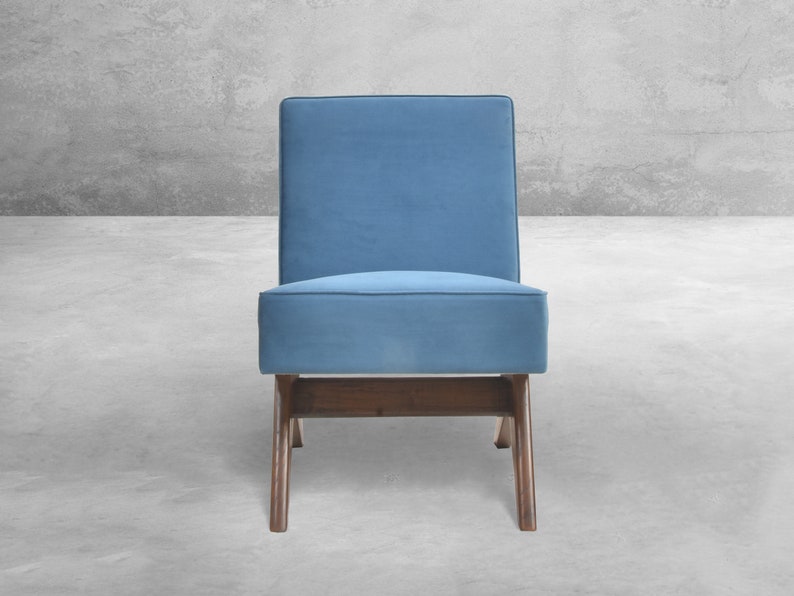 May include: A blue upholstered chair with a wooden frame and a simple, modern design.