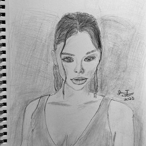 May include: A pencil drawing of a person with long dark hair, wearing a low-cut sleeveless top. The person is looking directly at the viewer.