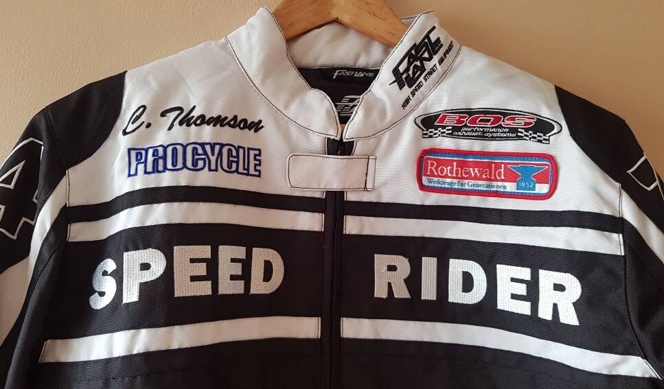 Trendy Fast Lane Speed Rider Racing Jacket With Logo Patches and