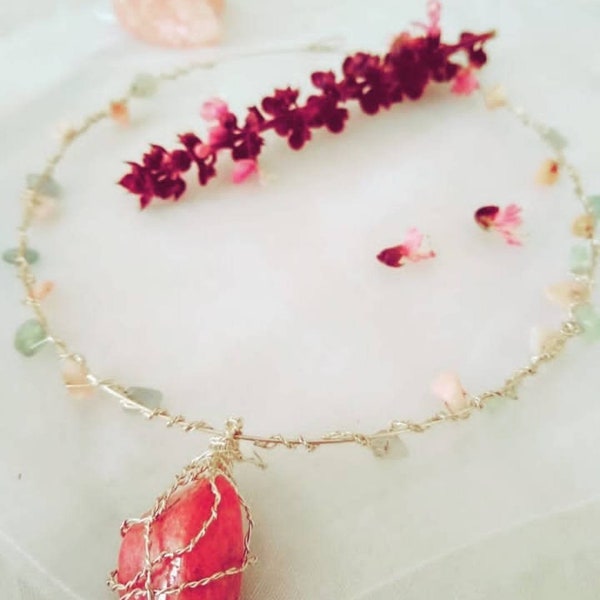 Stunning, chic and glamorous rhodochrosite choker style necklace. Featuring pink opals and rainbow fluorite on a silver plated neck cuff.