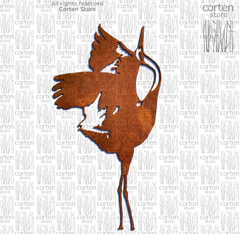 May include: A rusty metal sculpture of a crane with its wings spread. The sculpture is standing on a white background.