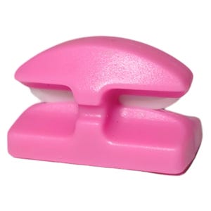 May include: A pink plastic cable organizer with a white center. The organizer has a curved top and a flat bottom.