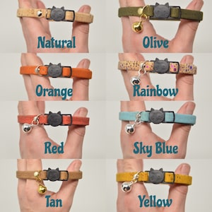 K&ouml;nnte beinhalten: Ein Set aus zehn Katzenhalsb&auml;ndern aus Kork mit einer Glocke und einem Katzenanh&auml;nger. Die Halsb&auml;nder sind in verschiedenen Farben erh&auml;ltlich, darunter Natur, Oliv, Orange, Regenbogen, Rot, Himmelblau, Braun und Gelb.