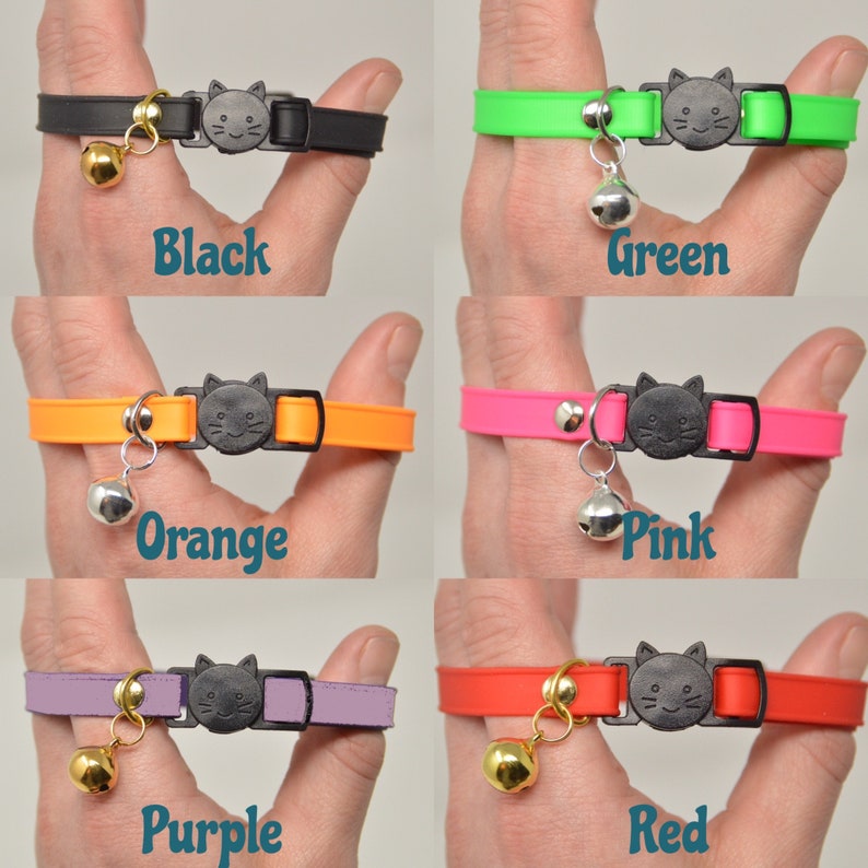 May include: Six different colored cat collars with a black cat face buckle and a bell. The colors are black, green, orange, pink, purple, and red.
