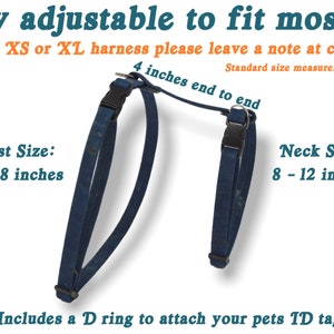 May include: A blue adjustable cat harness with black buckles. The harness is 4 inches long and has a chest size of 10-18 inches and a neck size of 8-12 inches. The text "Standard size measurements shown" is included in the image.