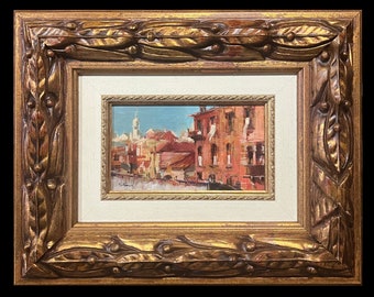 A delightful original French antique framed 1950s graceful view of Venice and the Canal presented in a gorgeous golden framepiece