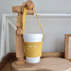 Gelber Cupholder / Cupträger