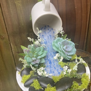 Floating cup centerpiece Waterfall sculpture natural elements succulents