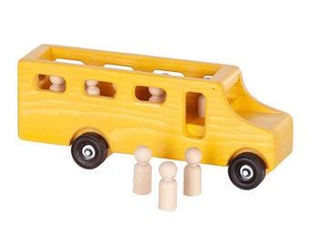 May include: A yellow wooden toy school bus with black wheels and three small wooden peg people. The bus has open windows and a door. The toy is designed for children.