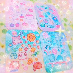 May include: Four sheets of colorful stickers with a variety of cute designs, including animals, flowers, hearts, and stars. The stickers are on a white background with a glittery finish.