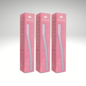 May include: Three pink boxes with a white and silver electric razor inside. The boxes have the text "SHAVE ESSENTIALS" on the side and "SHAVE essentials.com" on the front.