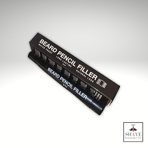 May include: Black beard pencil filler in a black tube with white text that reads "Beard Pencil Filler" and "Water Proof, Long Lasting, Natural Look".