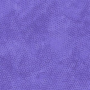 May include: A close-up of a purple fabric with a repeating geometric pattern. The pattern consists of small, interconnected circles and hexagons, creating a textured surface. The color is a vibrant shade of purple, with subtle variations in tone across the fabric.