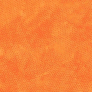 May include: Orange textured background with a subtle pattern of small circles and hexagons.
