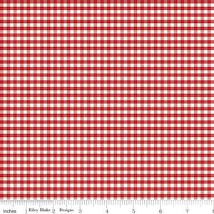 May include: Red and white gingham fabric with a classic checkered pattern. The fabric is marked with inches along the bottom edge. The Riley Blake Designs logo is visible.