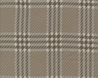 May include: A seamless pattern featuring a classic houndstooth and plaid design. The fabric has a neutral color palette of tan, beige, and white, creating a textured, woven appearance. The pattern is suitable for various applications.