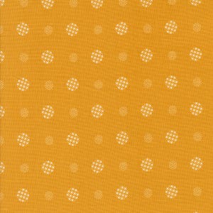 May include: A yellow fabric with a white pattern of small circles with a houndstooth design.