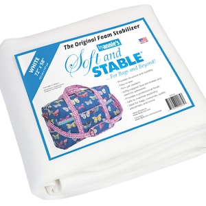 May include: White foam stabilizer, 72" x 58", for bags and beyond. The product features the text "Soft and Stable" and includes an image of a blue bag with butterfly patterns. The product is made in the USA.