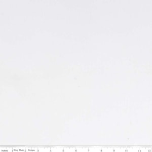 May include: A white fabric swatch with a ruler showing measurements in inches.