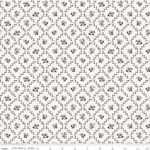 May include: Cream-colored fabric with a repeating pattern of gray flowers and dark gray vines arranged in a diamond grid. The flowers are clustered, and the vines have small leaves. The fabric has a vintage, floral design.