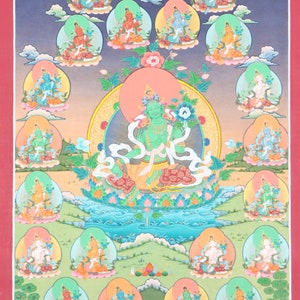 May include: A traditional Tibetan Buddhist thangka painting depicting the Green Tara, a female deity associated with compassion and protection. The central figure is surrounded by smaller figures of other deities, all seated on lotus flowers. The painting is done in vibrant colors and intricate details, with a background of clouds and mountains.