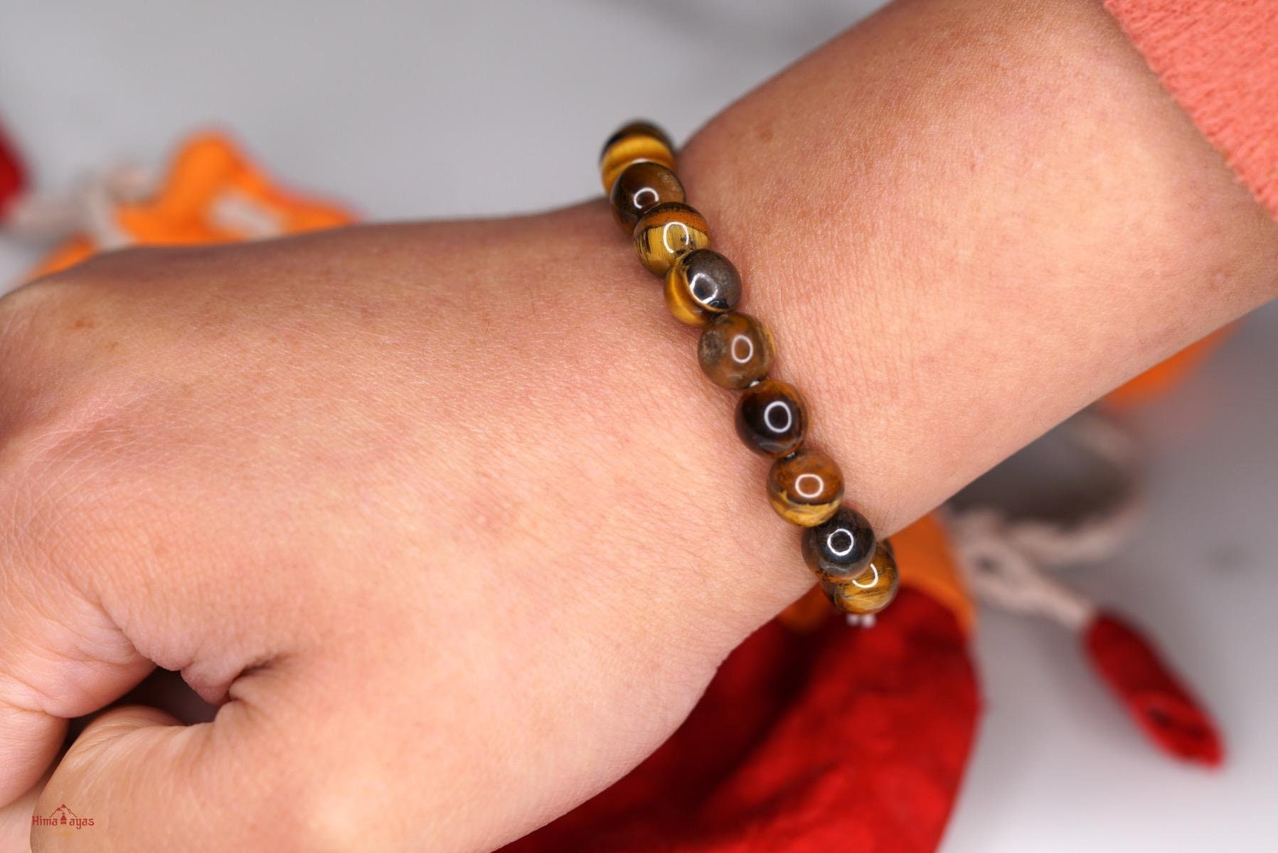Tiger eye bracelet wear on which hand deals