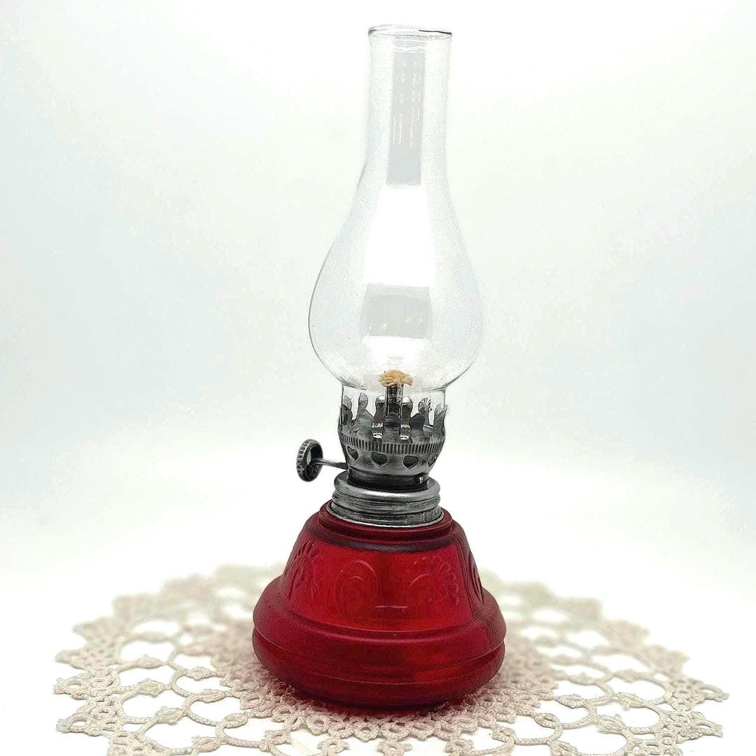 Vintage small oil lamp stylized horse pattern on ruby red glass oil