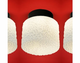 May include: Three white ceiling light fixtures with a black base and a textured, brain-like design.