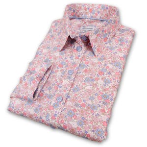 May include: A white button-down shirt with a pink and blue floral print. The shirt has a collar and long sleeves.
