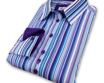 May include: A striped long-sleeved shirt with a purple collar and cuffs. The shirt has a variety of blue, purple and white stripes.