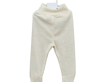 Fine baby trousers with feet and a wide waistband made of merino wool