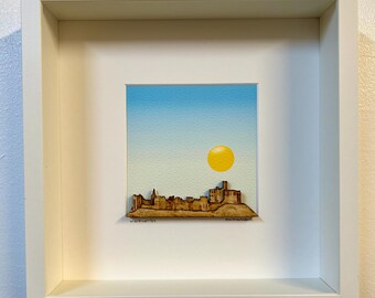 Warkworth Castle made from layered wood with blue sky background