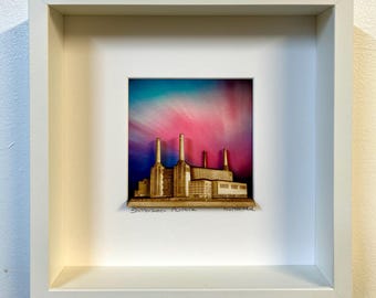 Battersea Power Station made from layered wood with Northern Lights Aurora sky background