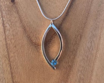 Sterling Silver bar pendant handmade set with a swiss Blue topaz