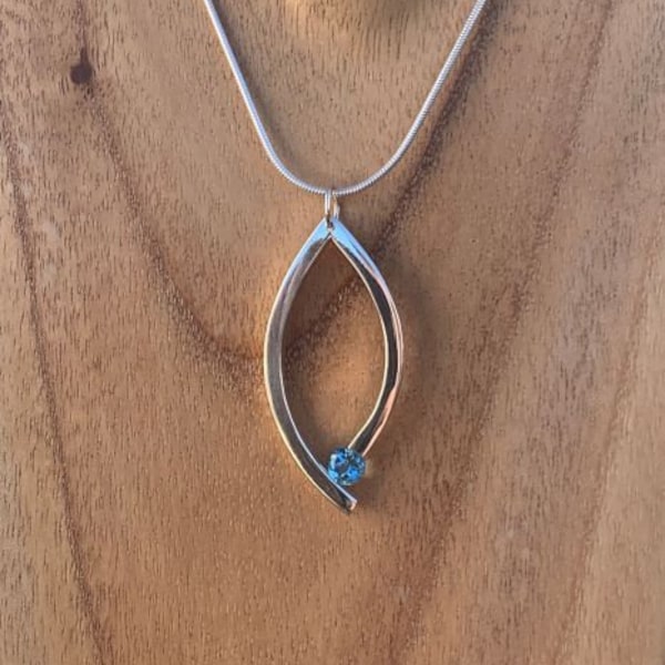 Sterling Silver bar pendant handmade set with a swiss Blue topaz