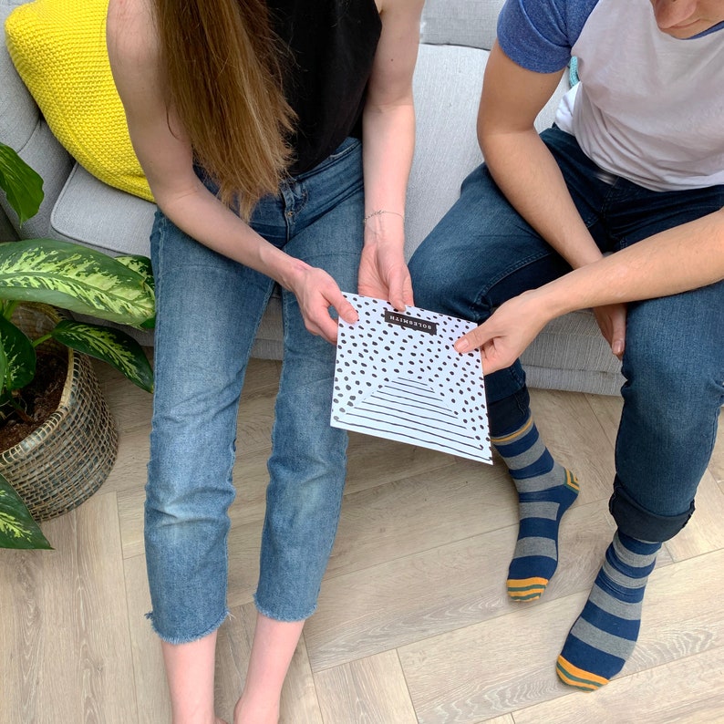 May include: A black and white printable page with a black and white polka dot pattern. The page has a section for writing with black lines and the word 'Imagination' printed in black at the top of the page.