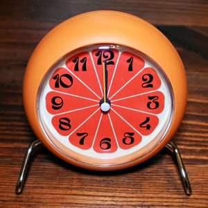1970s 4" Retro Grapefruit Sunburst Desktop Clock with Night Light