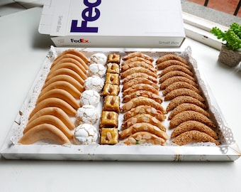 Assorted cookies tray of moroccan almond sweets in a cookie gift box