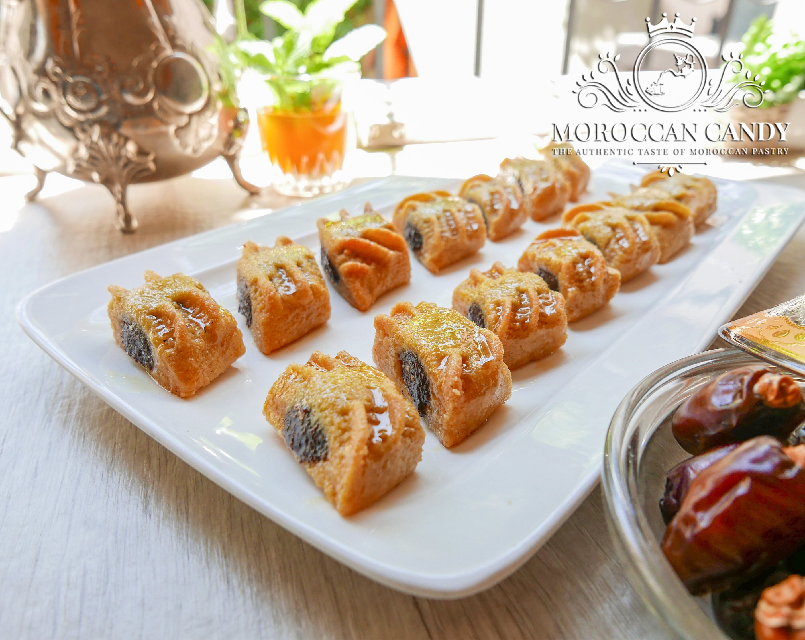 MAKROUTE dates stuffed cookies - Algerian, Moroccan, Tunisian Maamoul honey cakes filled with Medjool Dates - Sweets baked in the oven
