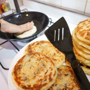 MSEMEN Moroccan bread sweet pancake or stuffed food with khlii and garlic in flatbread