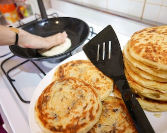 MSEMEN Moroccan bread sweet pancake or stuffed food with khlii and garlic in flatbread