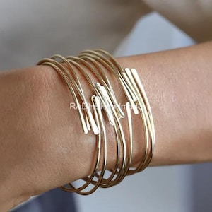 7-set armband i 14k guld, armband i massivt guld, tunna guldarmband, fina guldarmband, stapelbara guldarmband, armbandsset i guld