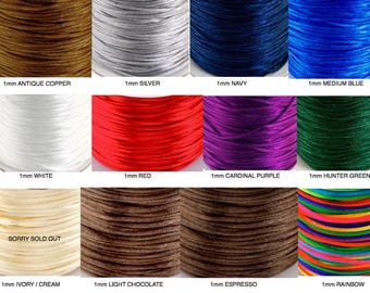 May include: A collection of 1mm cord spools in various colors including antique copper, silver, navy, medium blue, white, red, cardinal purple, hunter green, ivory, light chocolate, espresso, and rainbow, with text labels identifying each color.