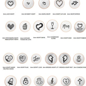 May include: A collection of ImpressArt metal stamps featuring heart and love designs. The set includes icons like a lace heart, cupcake, champagne glass, broken heart, diamond ring, and cross heart, with labels indicating 3mm or 6mm sizes.